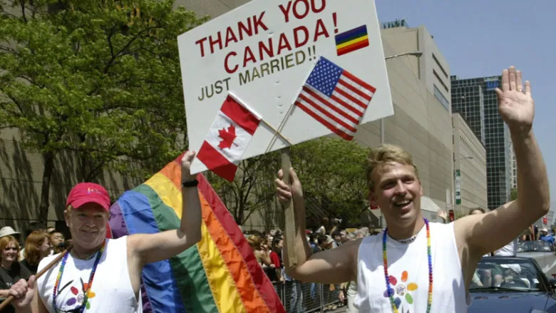 Two men thanking Canada for the ability to marry